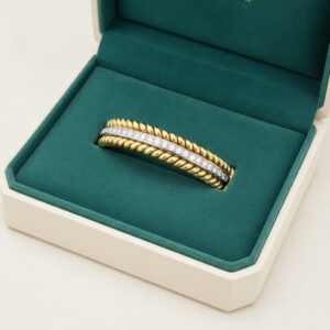 Bracciale rigido "torchon" in oro 18 kt con diamanti