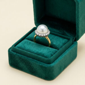 Anello in oro bicolore 18 kt con perla australiana e diamanti