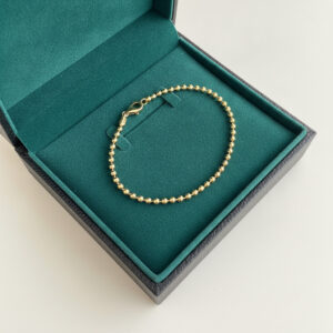 Bracciale a pallini in oro giallo 18 kt